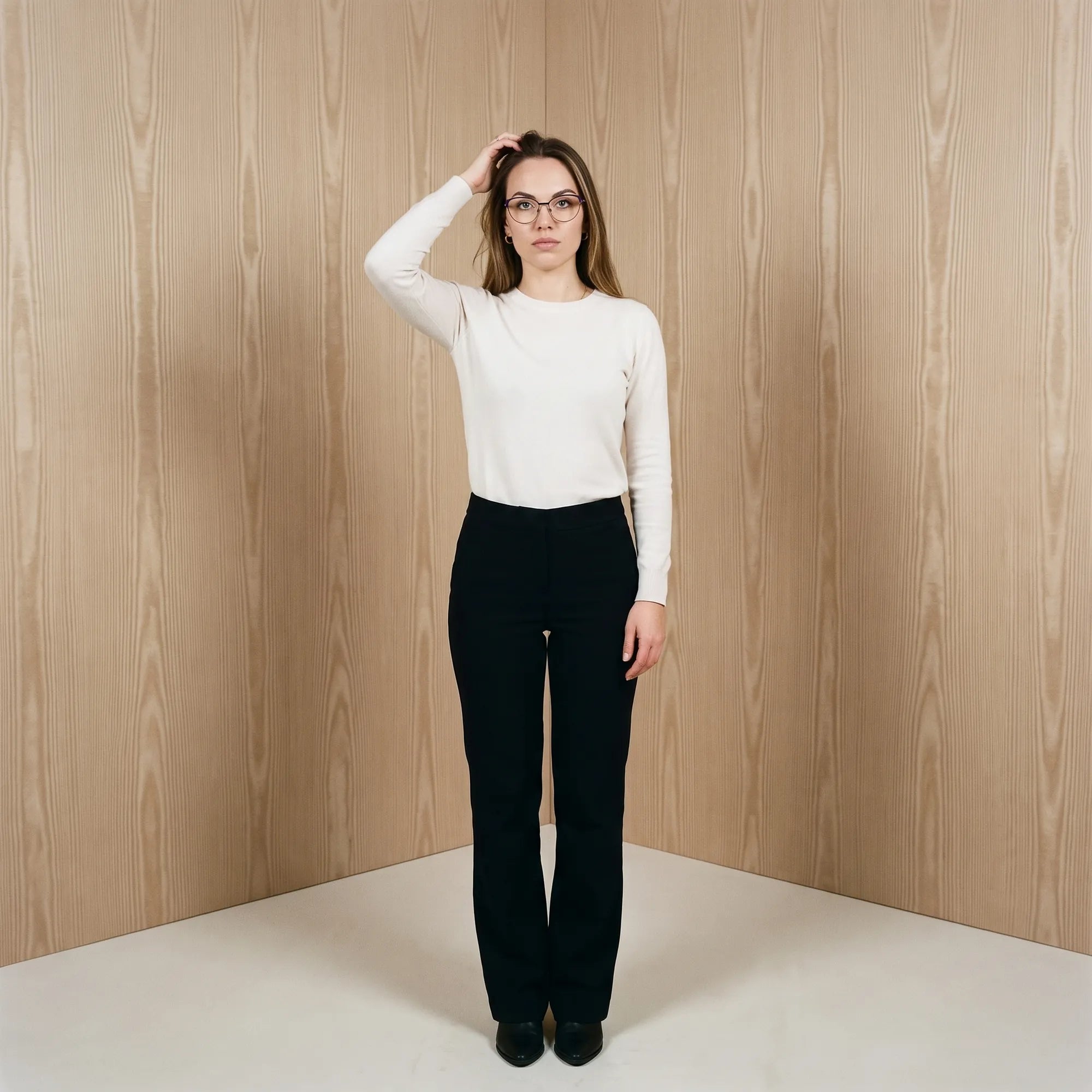 Fiore 3983 eyeglasses in black blue, worn by a model – campaign portrait, soft portrait in blush moire tones