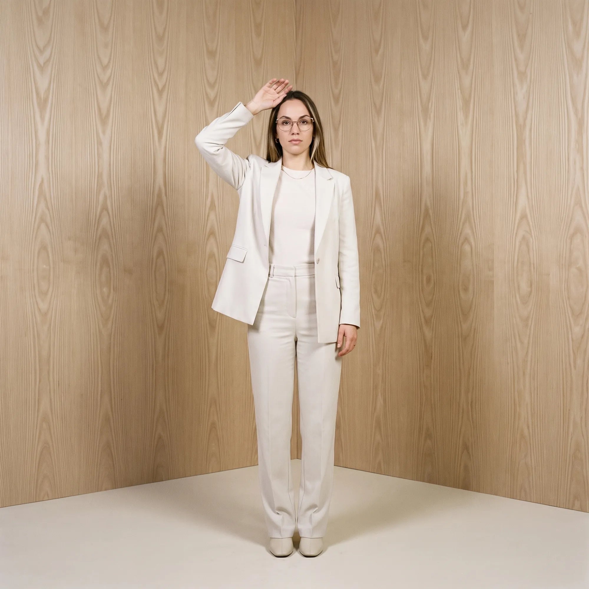 Fiore 3983 eyeglasses in grey gun, worn by a model – campaign portrait, soft portrait in blush moire tones