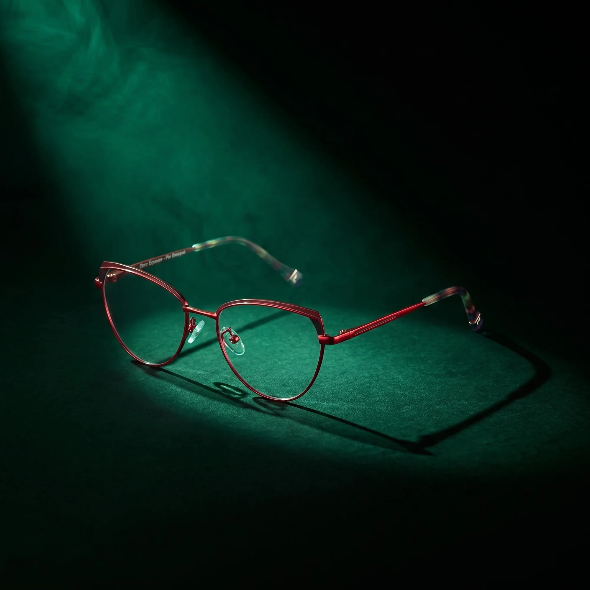 Fiore 3983 eyeglasses in red black – under a theatrical beam of light