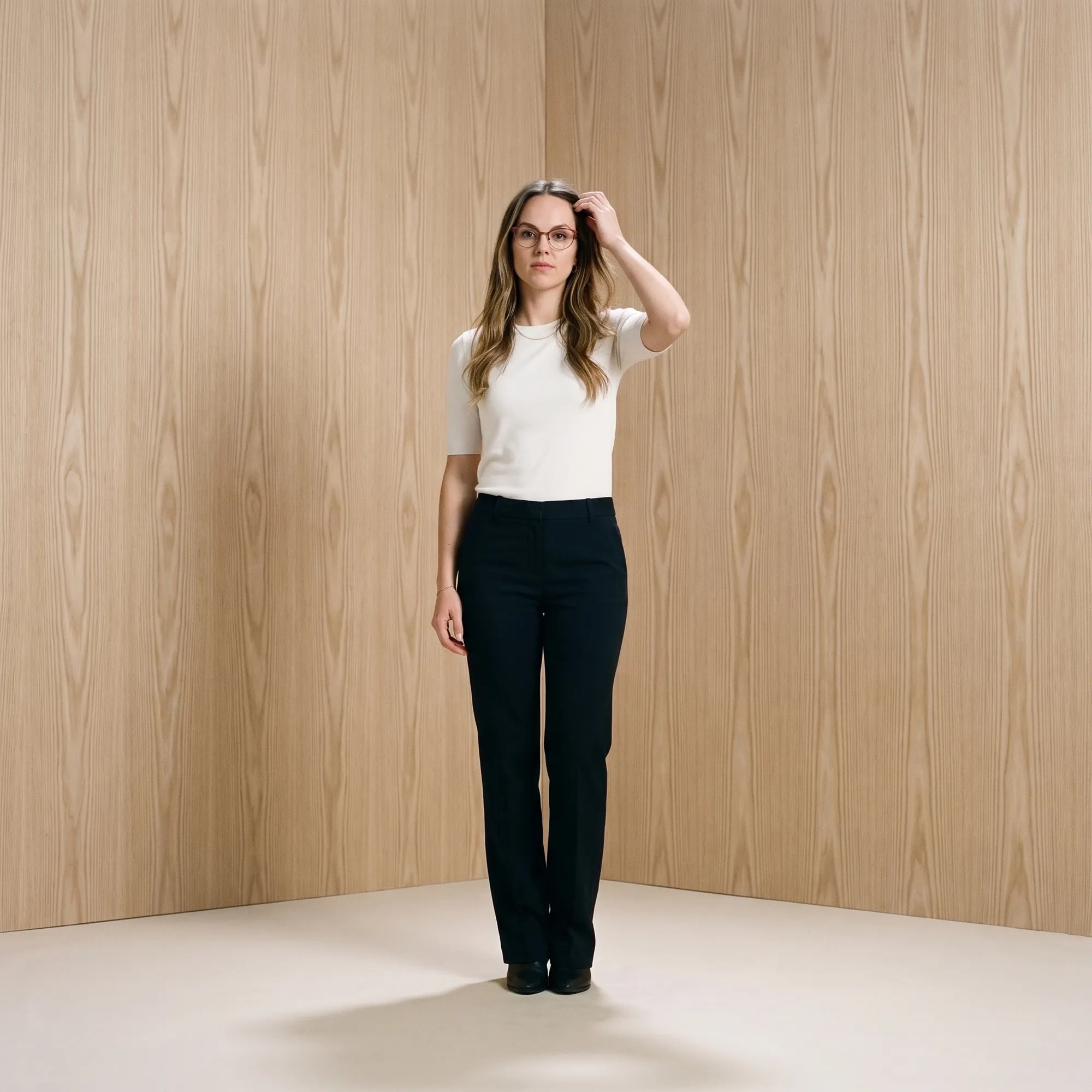 Fiore 3983 eyeglasses in red black, worn by a model – campaign portrait, soft portrait in blush moire tones