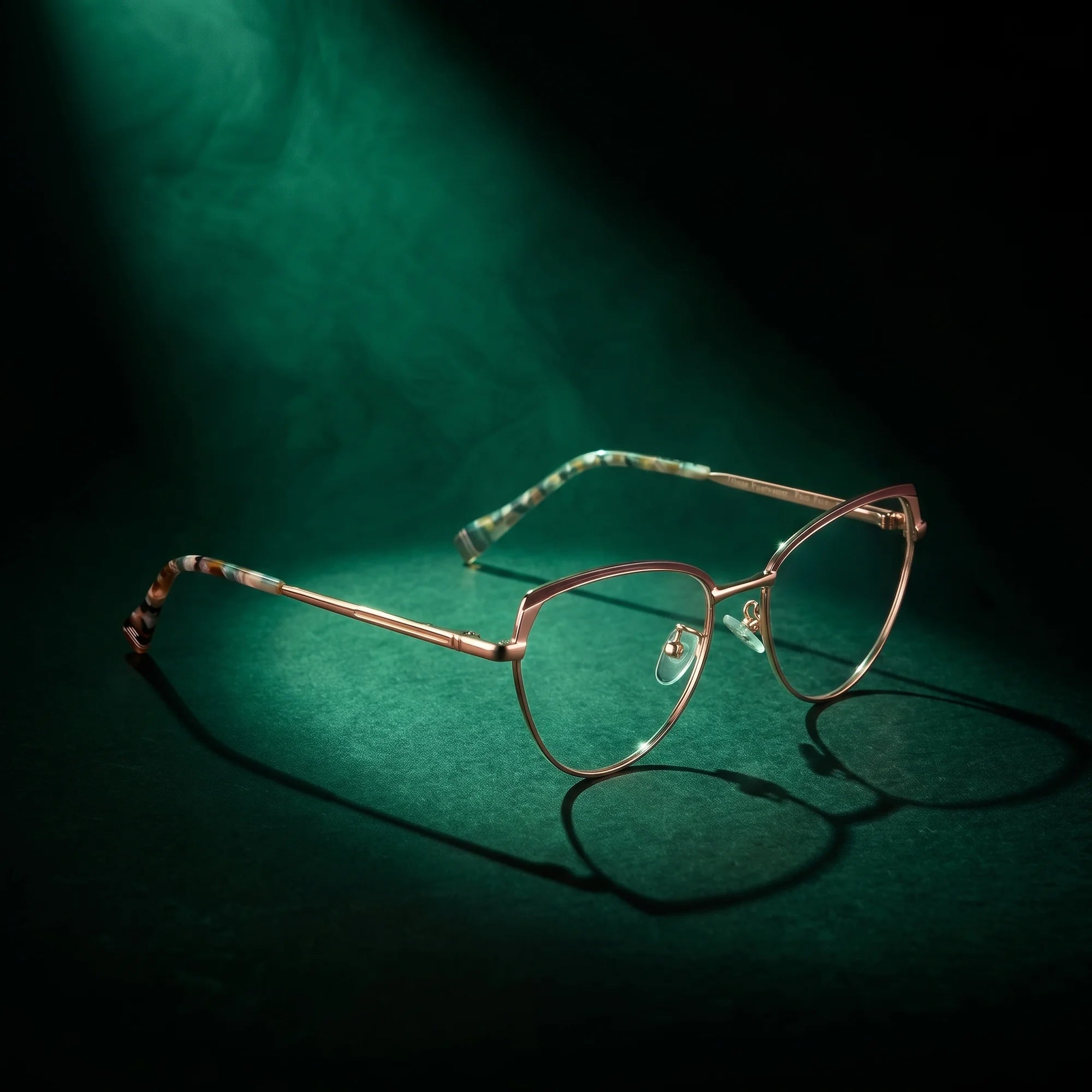 Fiore 3983 eyeglasses in brown gold – under a theatrical beam of light