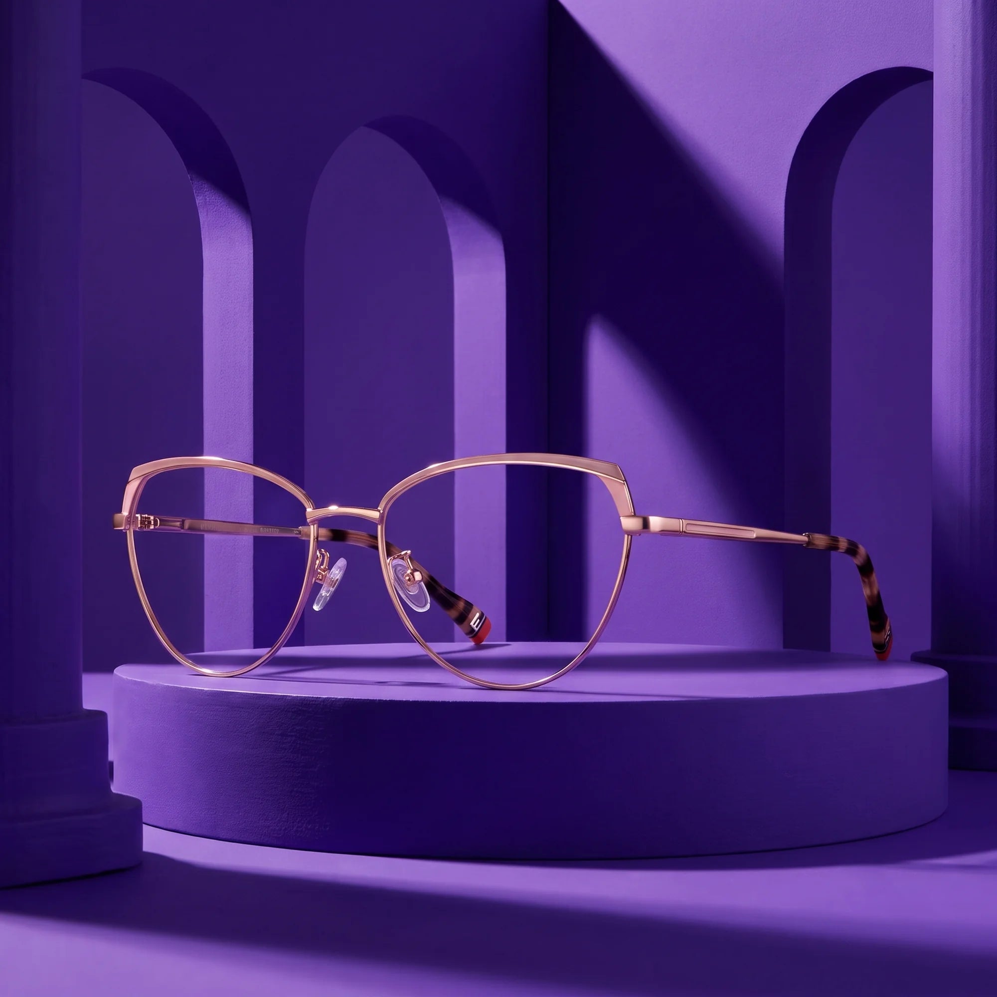 Fiore 3983 eyeglasses in pink gold – staged on a sculptural violet architecture set