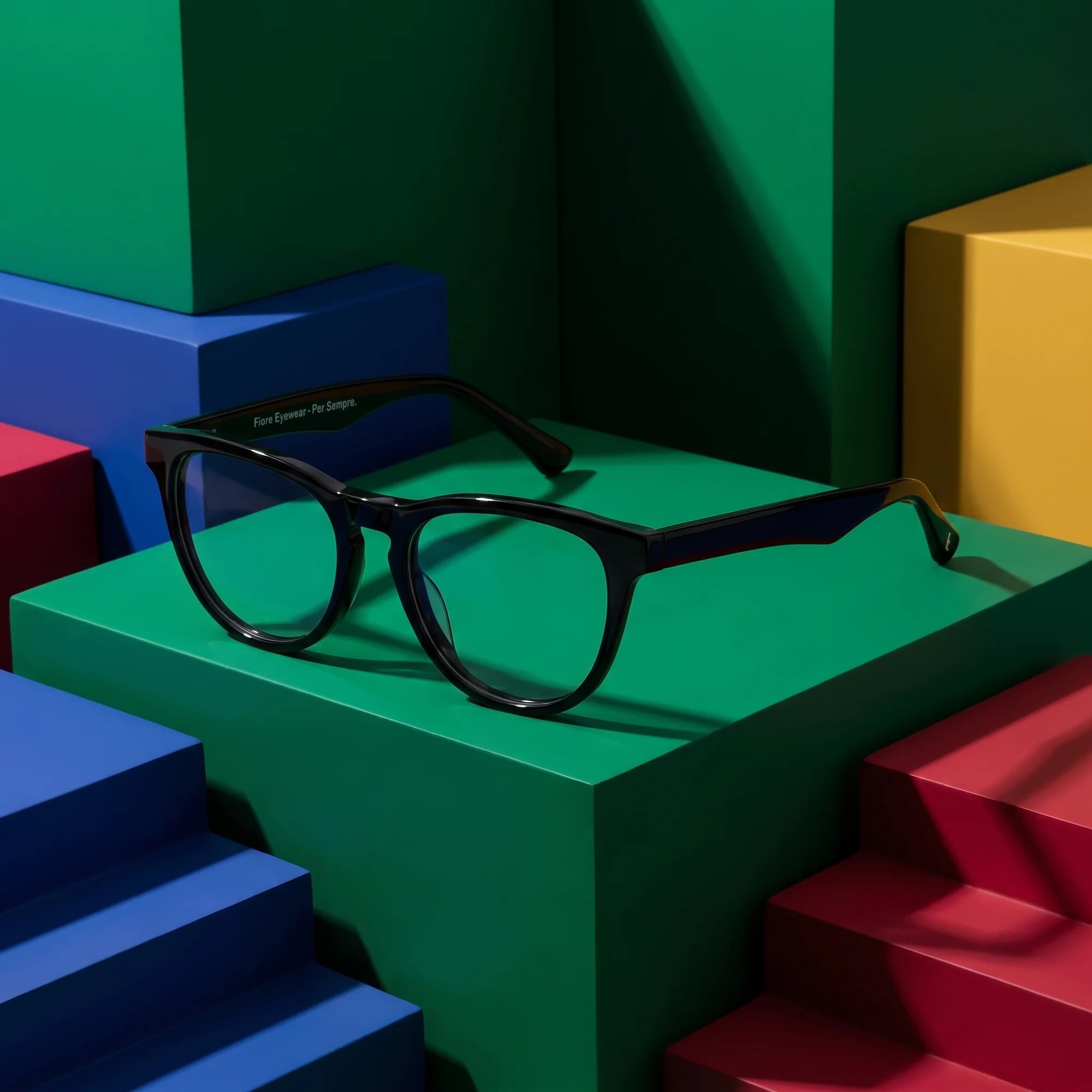 Fiore 4488 eyeglasses in black – on bold primary color-block steps