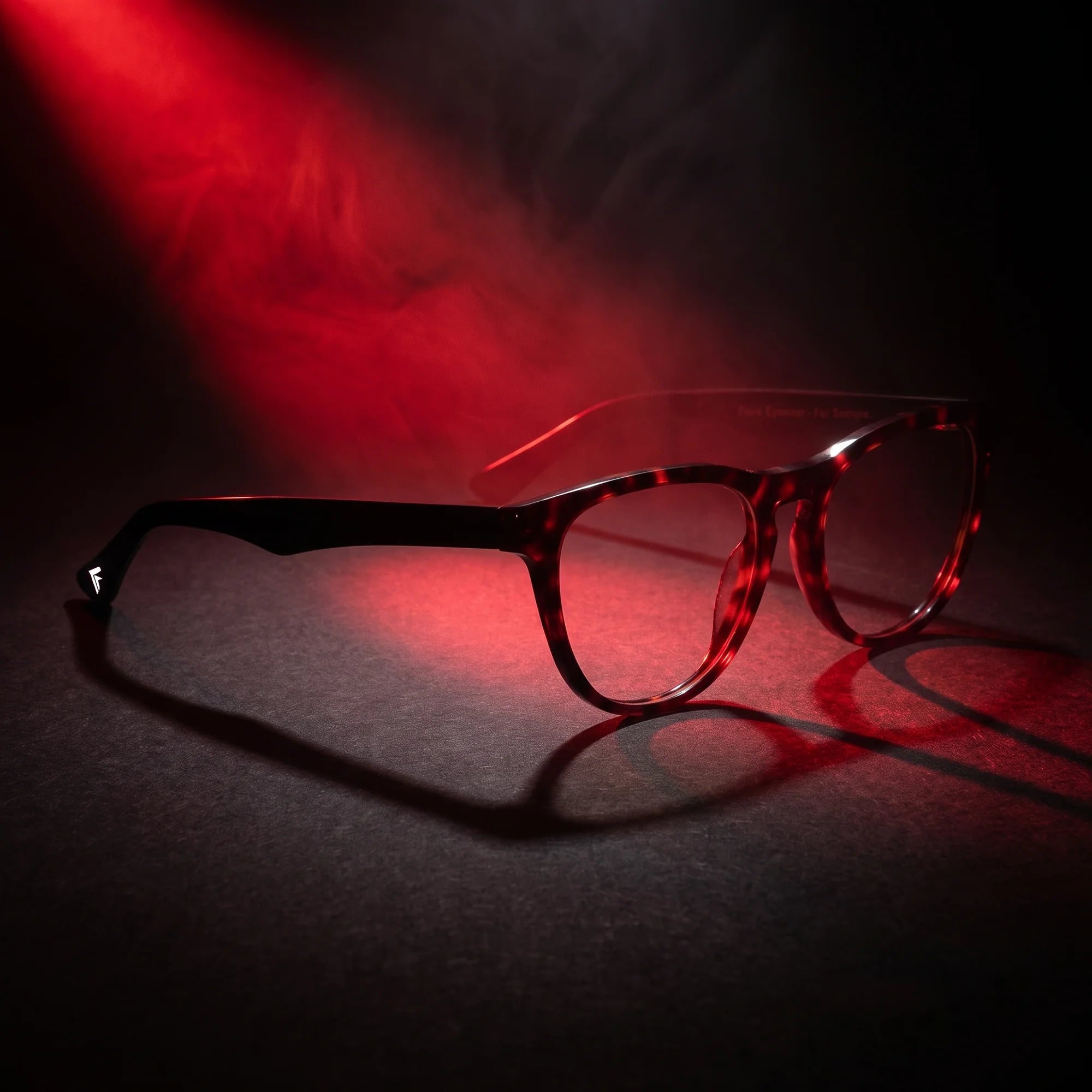 Fiore 4488 eyeglasses in tortoiseshell – under a theatrical beam of light