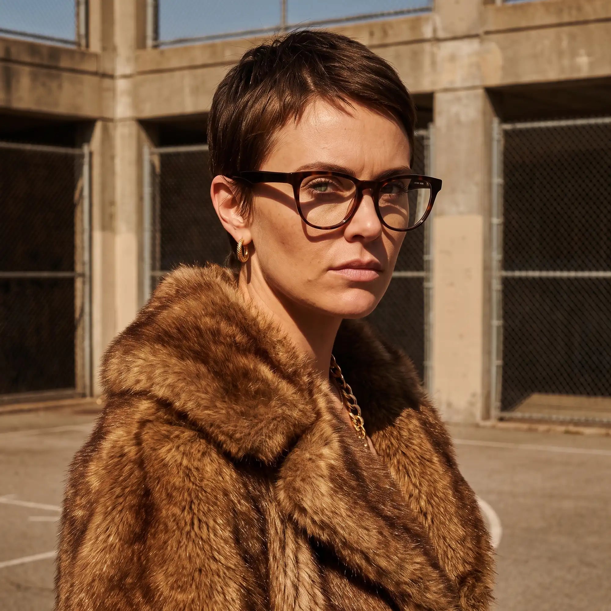 Fiore 4488 eyeglasses in tortoiseshell, worn by a model – campaign portrait, street portrait rooted in city heritage