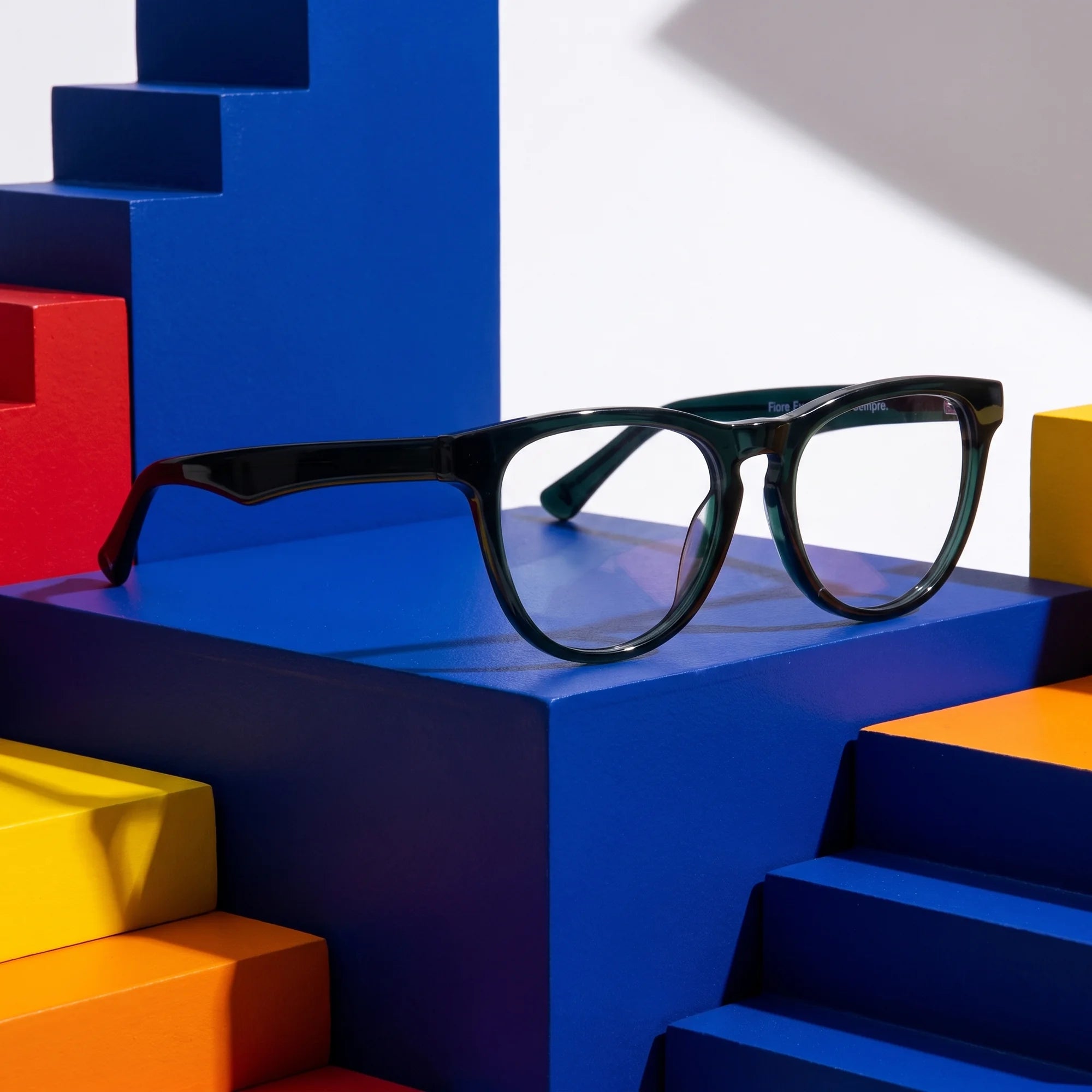 Fiore 4488 eyeglasses in green – on bold primary color-block steps