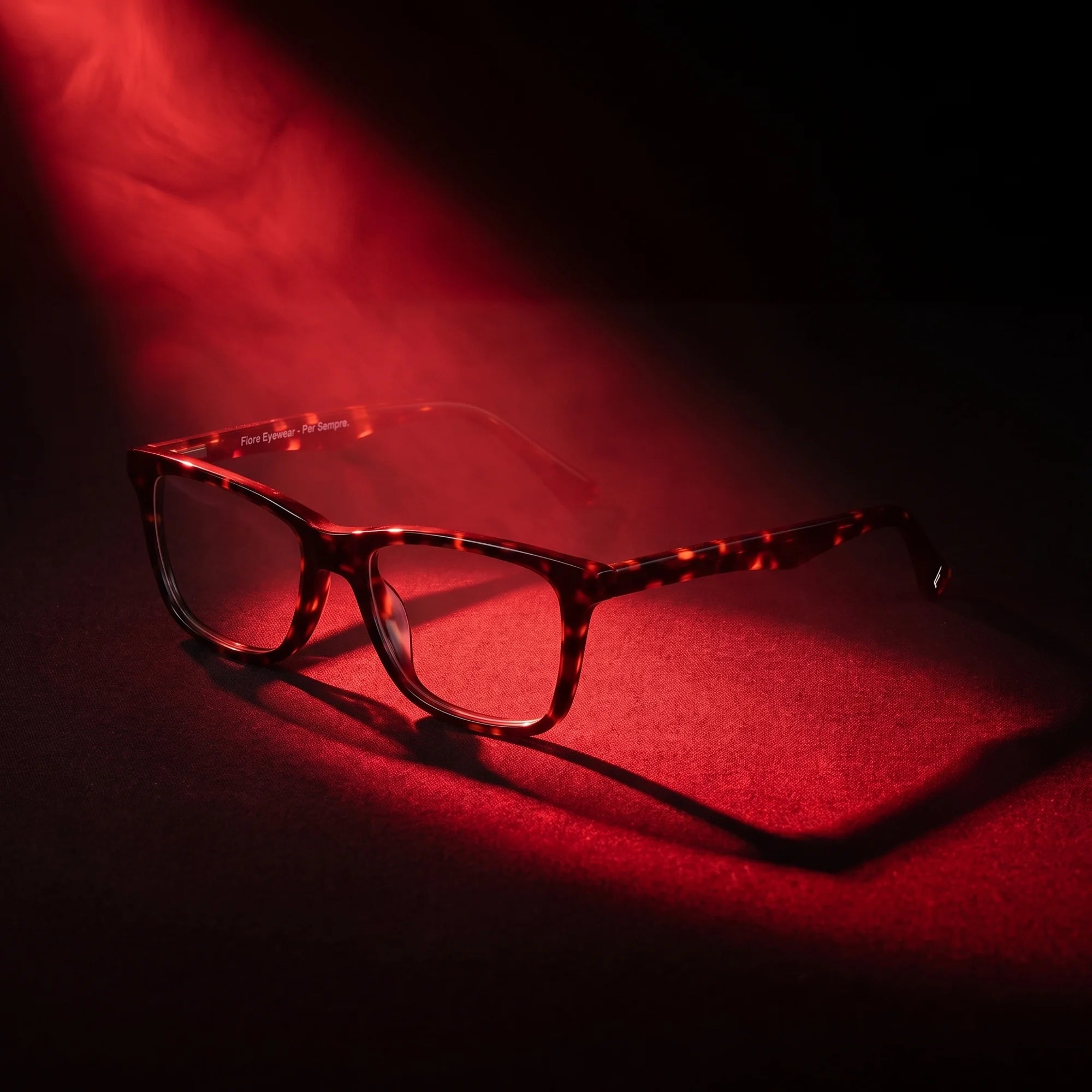 Fiore 5228 eyeglasses in tortoiseshell – under a theatrical beam of light