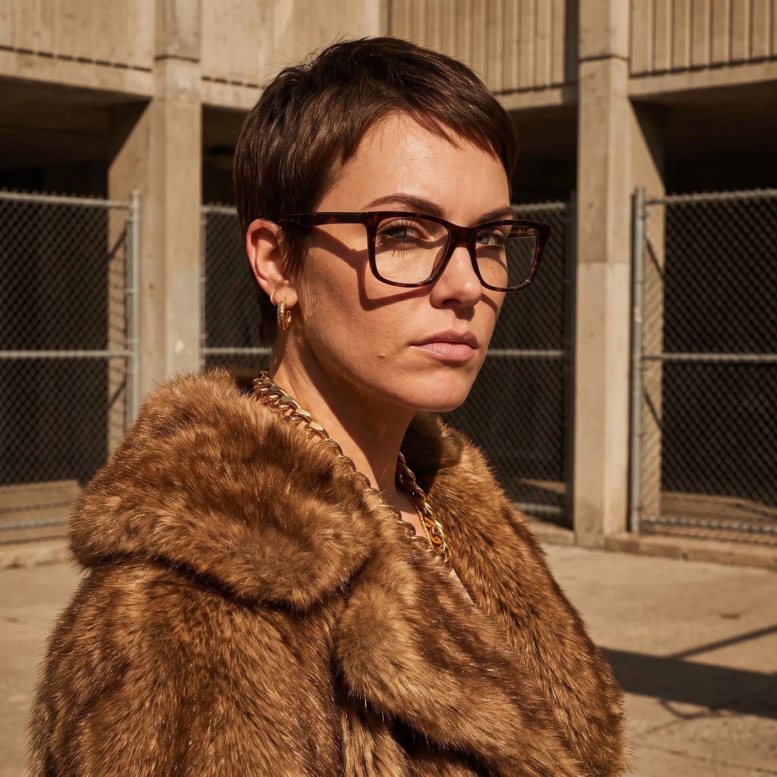 Fiore 5228 eyeglasses in tortoiseshell, worn by a model – campaign portrait, street portrait rooted in city heritage