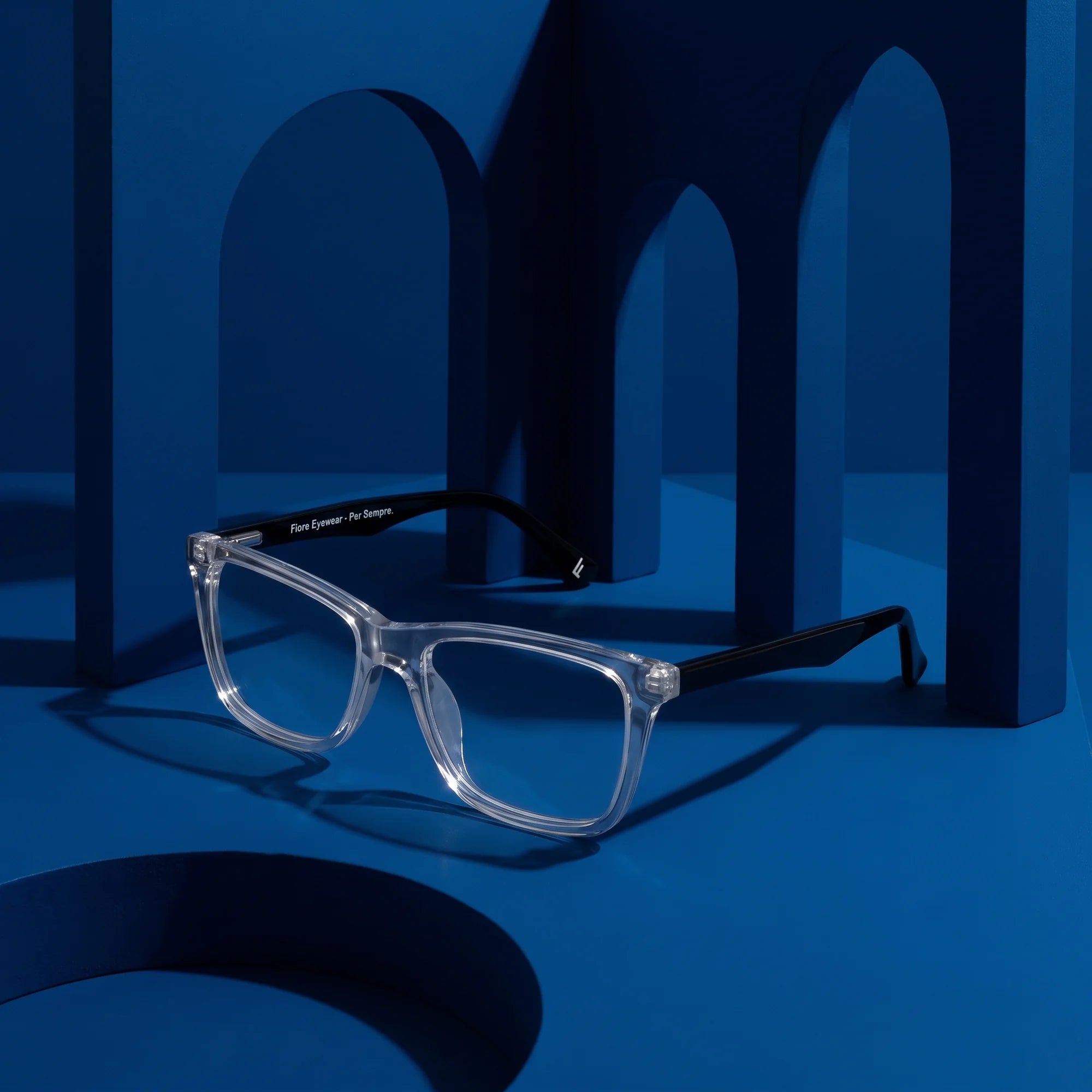 Fiore 5228 eyeglasses in transparent – still life among monochrome midnight blue arches