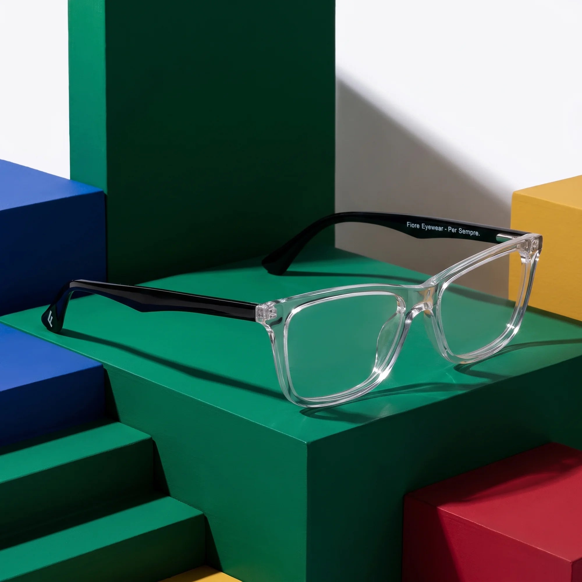 Fiore 5228 eyeglasses in transparent – on bold primary color-block steps