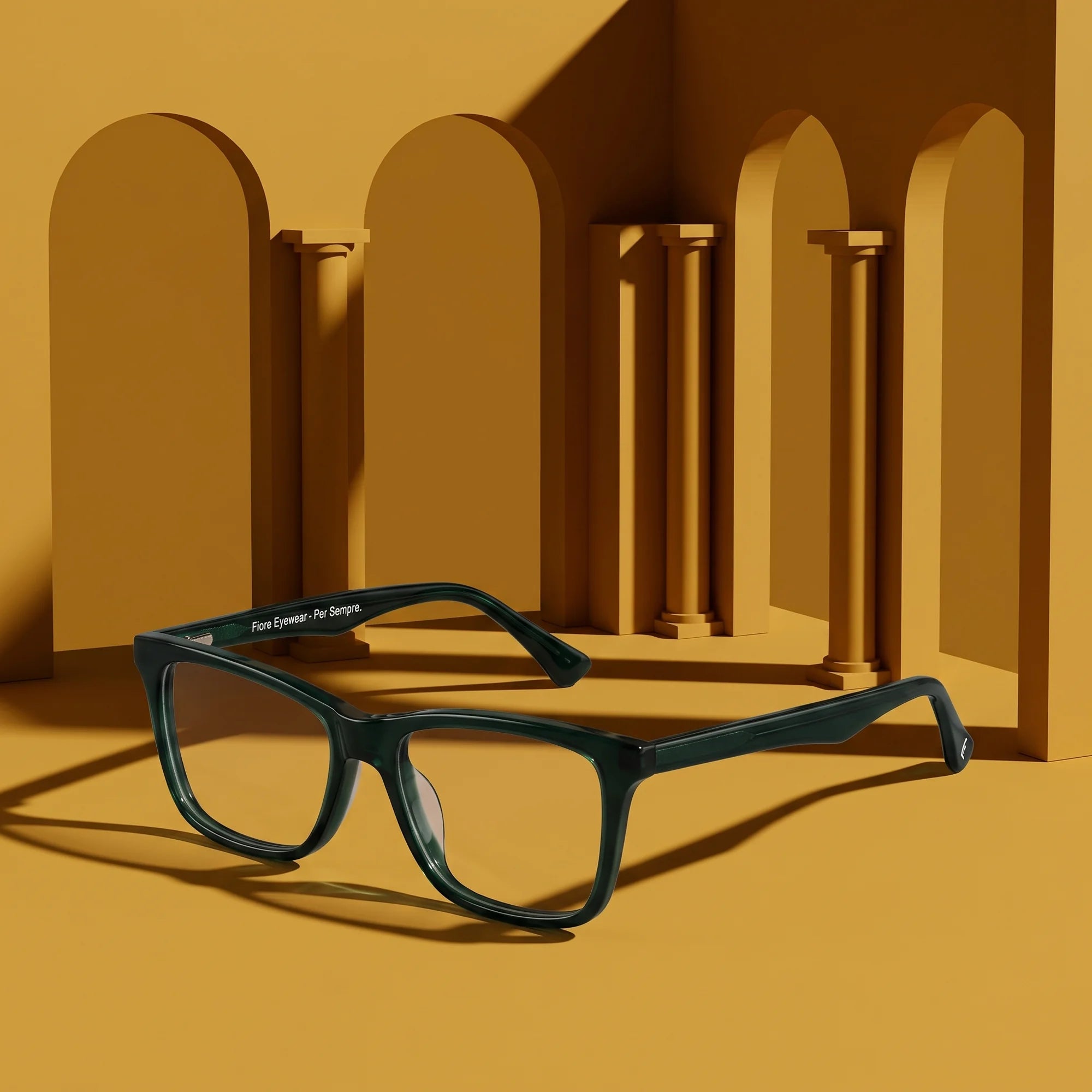 Fiore 5228 eyeglasses in green – still life among monochrome mustard ochre arches