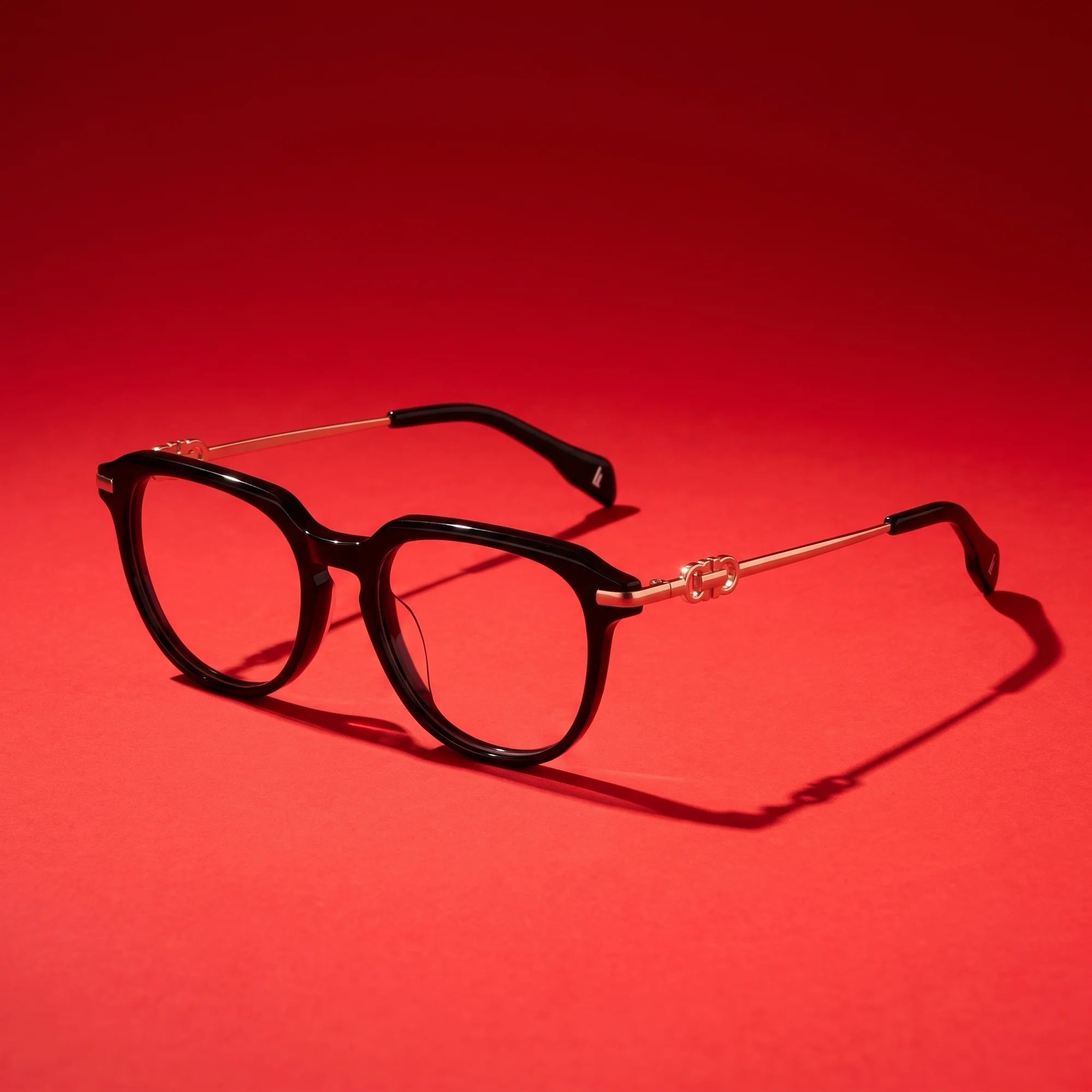 Fiore 5409 eyeglasses in black – editorial still life on a saturated vivid red set