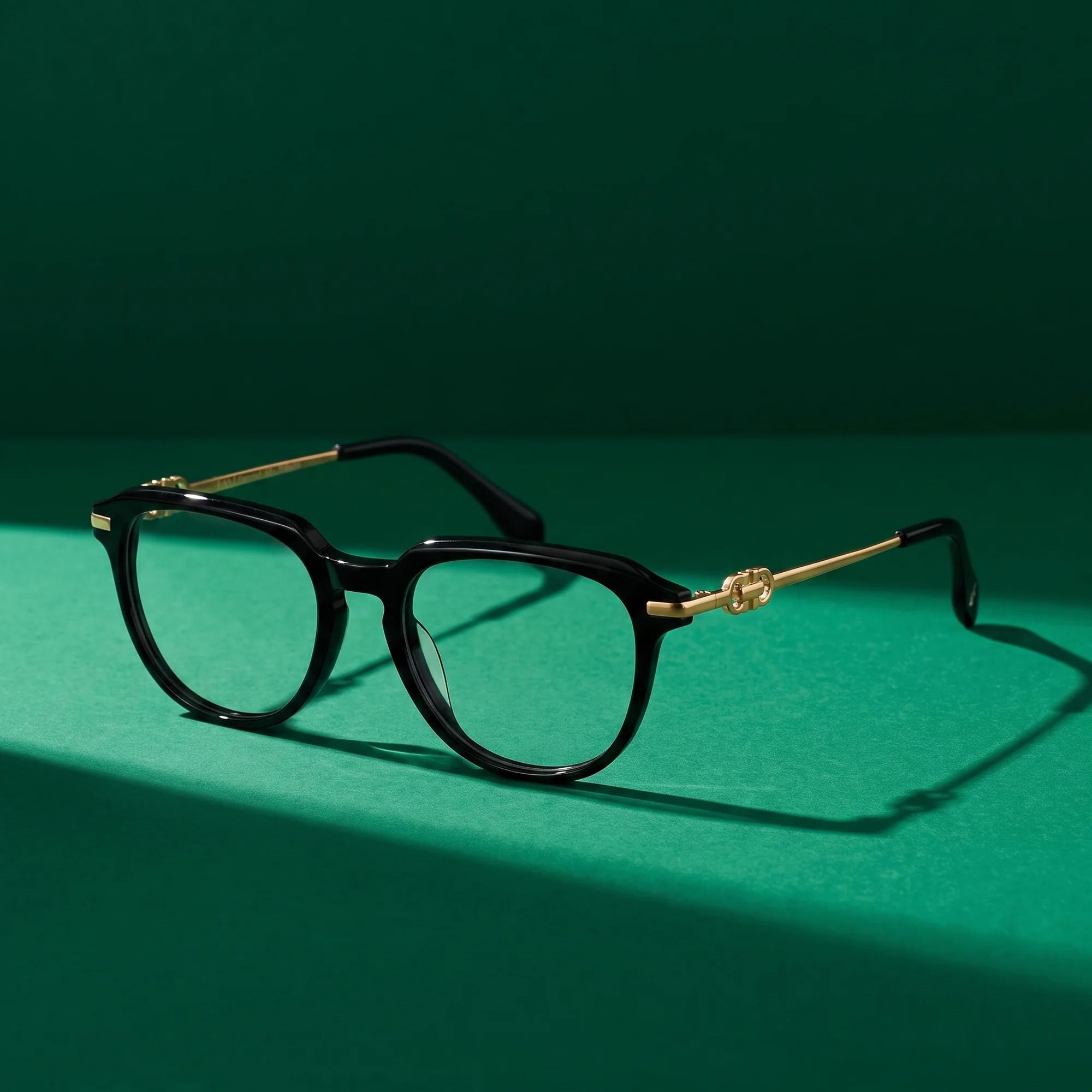 Fiore 5409 eyeglasses in black – still life on a seamless emerald studio backdrop