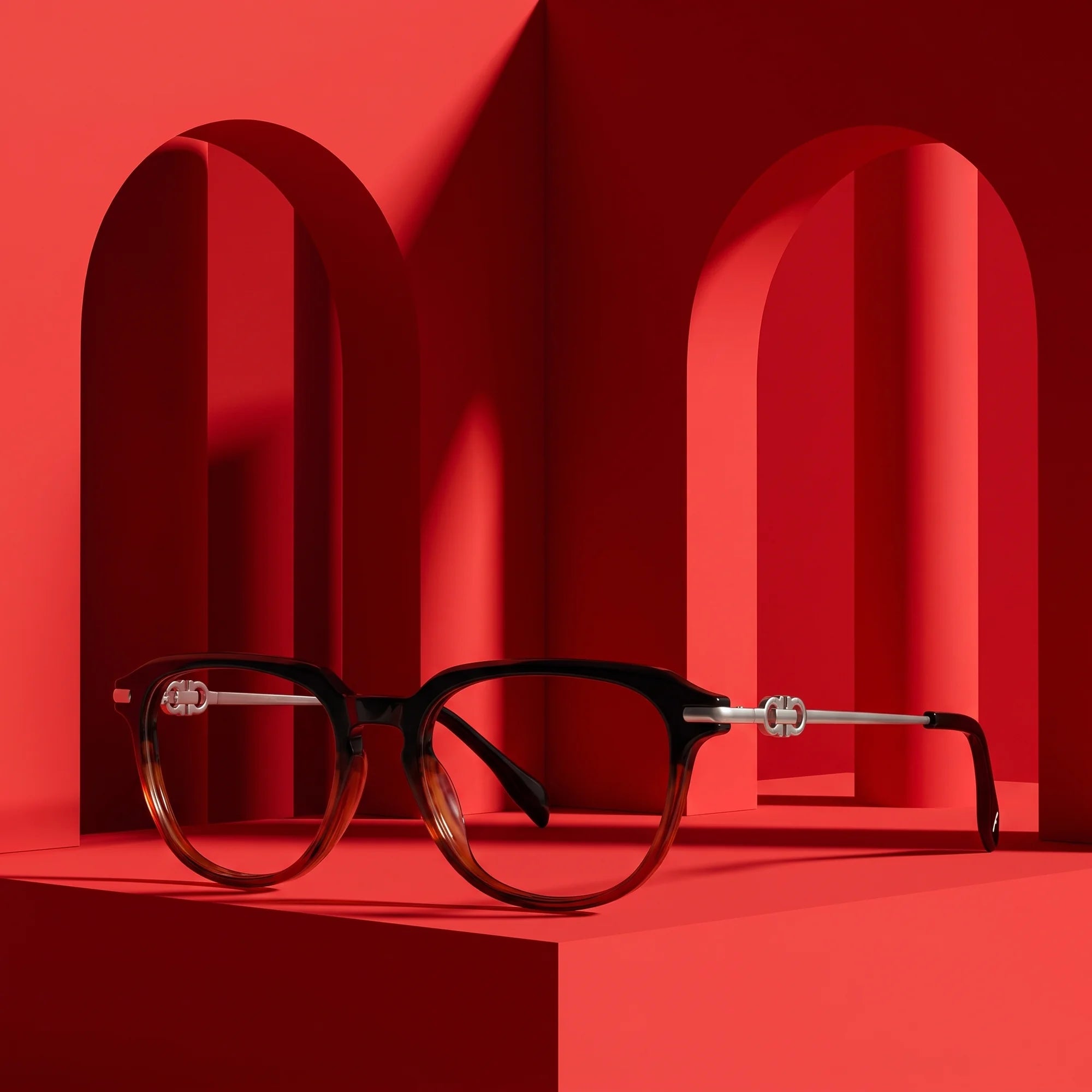 Fiore 5409 eyeglasses in black brown – staged on a sculptural vivid red architecture set