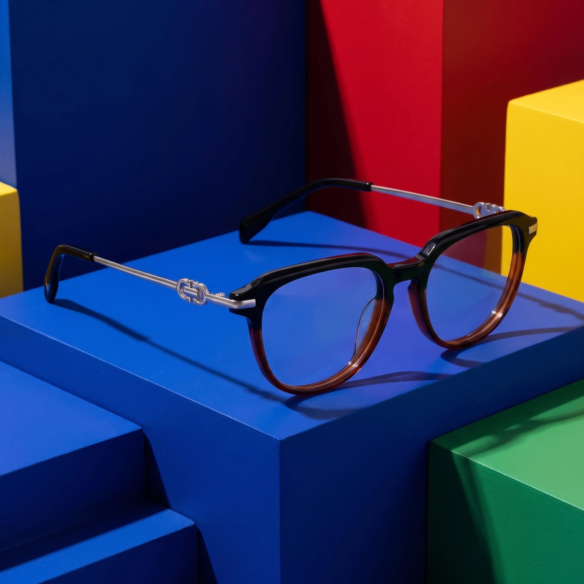 Fiore 5409 eyeglasses in black brown – on bold primary color-block steps