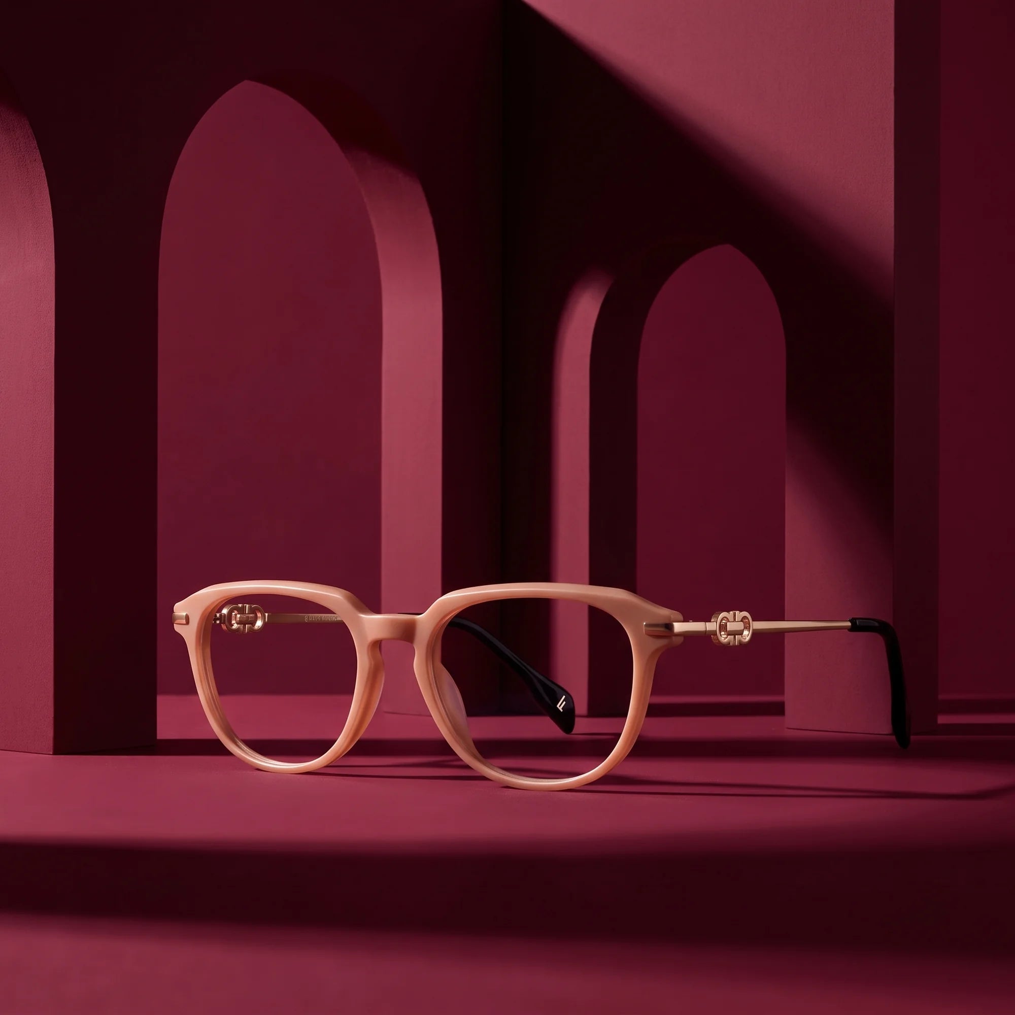 Fiore 5409 eyeglasses in milky white – displayed on a burgundy podium among arches