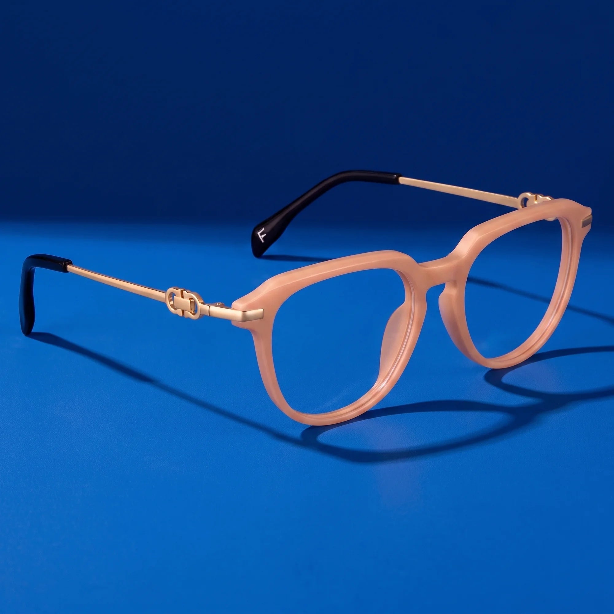 Fiore 5409 eyeglasses in milky white – still life on a seamless cobalt studio backdrop