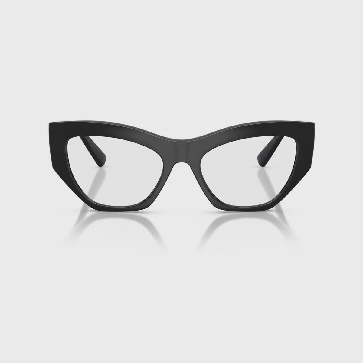 Vogue VO5607S photochromic brown replacement lenses, front video of the lenses darkening from clear to brown · ReFramed