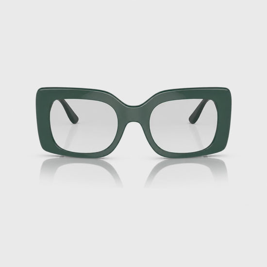 Vogue VO5481S photochromic gray replacement lenses, front video of the lenses darkening from clear to gray · ReFramed