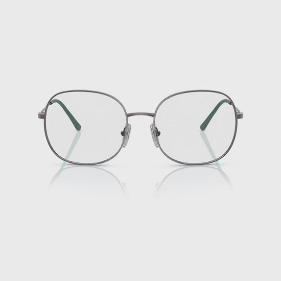 Vogue VO4272S photochromic brown replacement lenses, front video of the lenses darkening from clear to brown · ReFramed