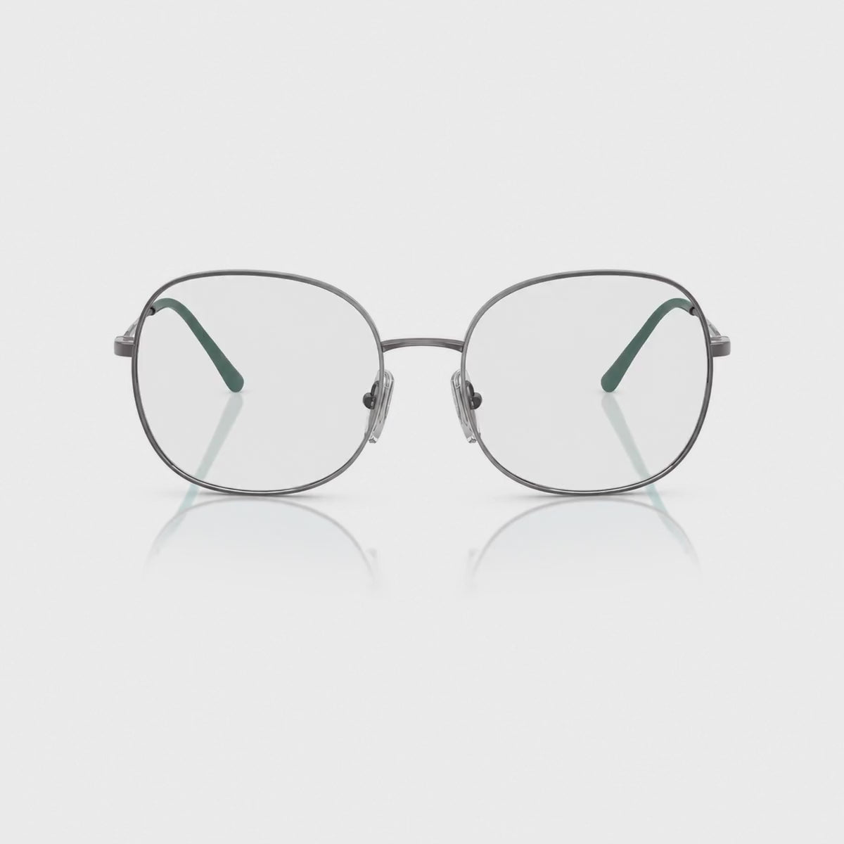 Vogue VO4272S photochromic brown replacement lenses, front video of the lenses darkening from clear to brown · ReFramed