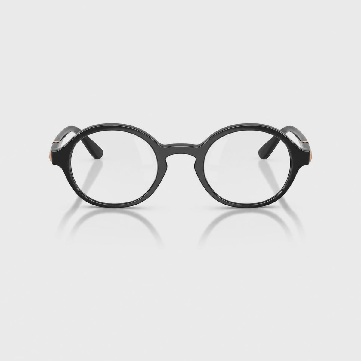 Vogue VO5692S photochromic gray replacement lenses, front video of the lenses darkening from clear to gray · ReFramed