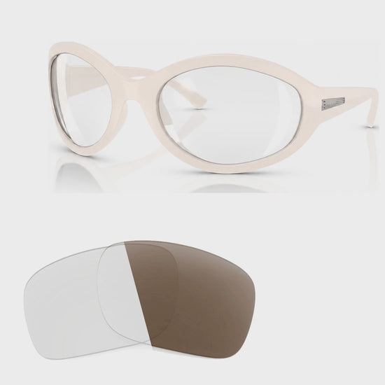 Vogue VO5606S photochromic brown replacement lenses, angled video of the lenses darkening from clear to brown · ReFramed