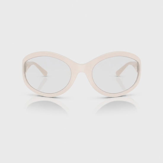 Vogue VO5606S photochromic gray replacement lenses, front video of the lenses darkening from clear to gray · ReFramed