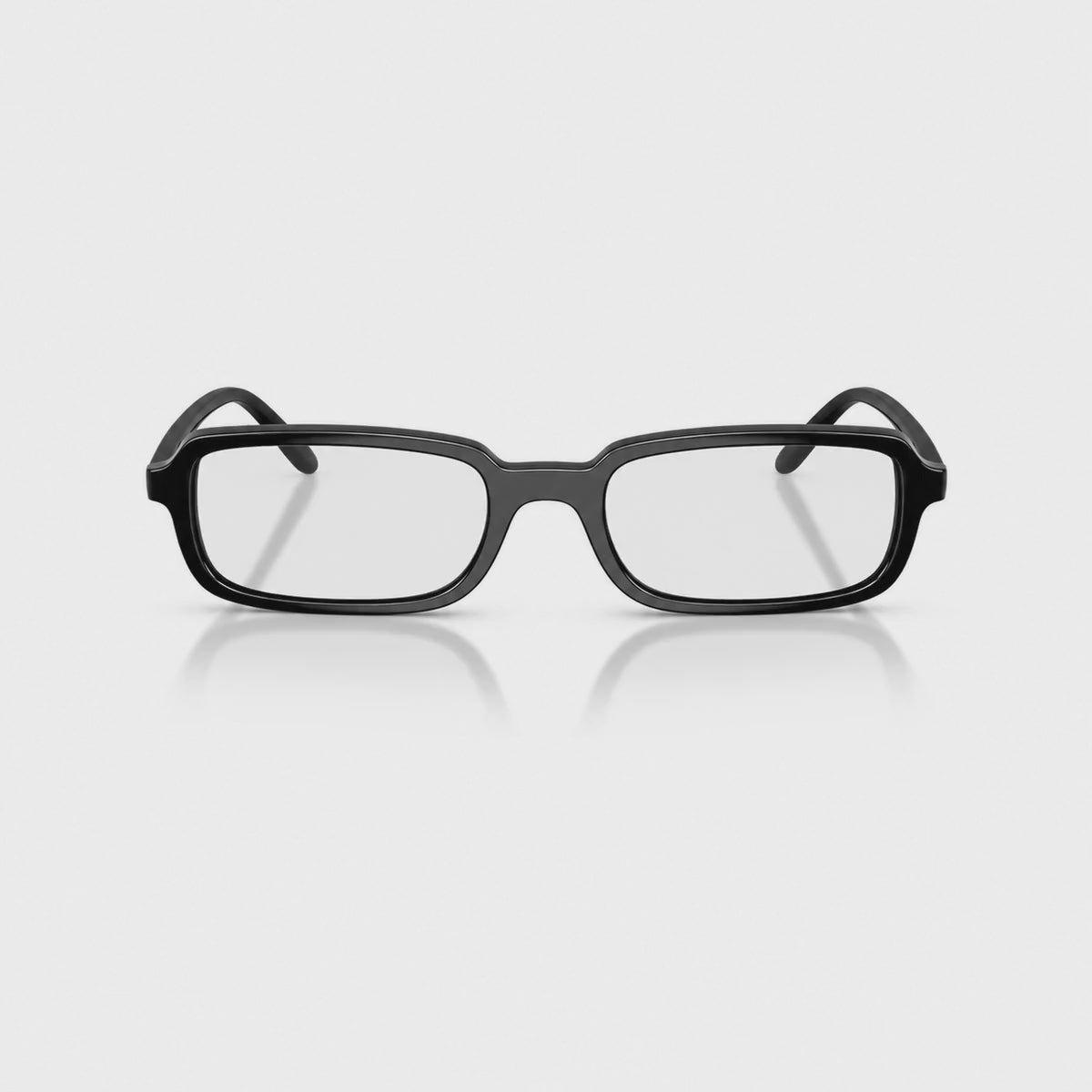Vogue VO5666S photochromic brown replacement lenses, front video of the lenses darkening from clear to brown · ReFramed