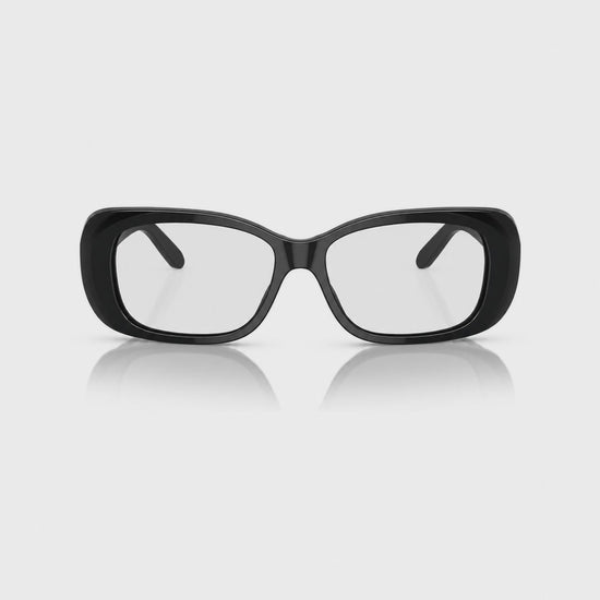Vogue VO2606S photochromic brown replacement lenses, front video of the lenses darkening from clear to brown · ReFramed