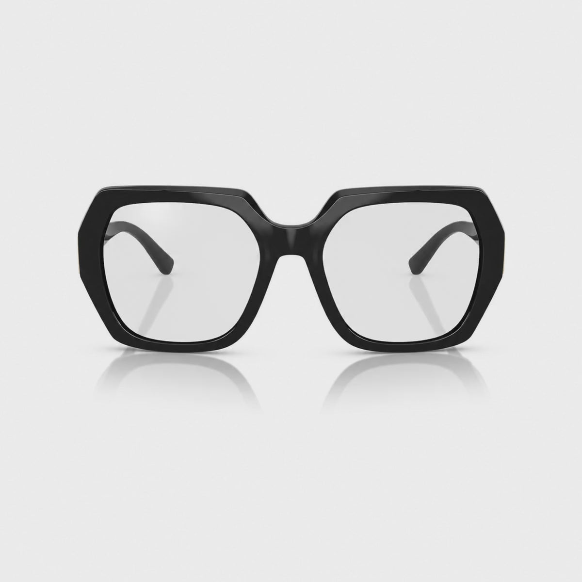Vogue VO5612SB photochromic brown replacement lenses, front video of the lenses darkening from clear to brown · ReFramed