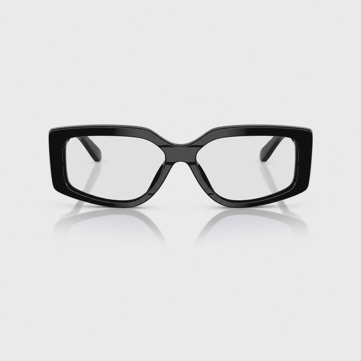 Vogue VO5642SU photochromic brown replacement lenses, front video of the lenses darkening from clear to brown · ReFramed