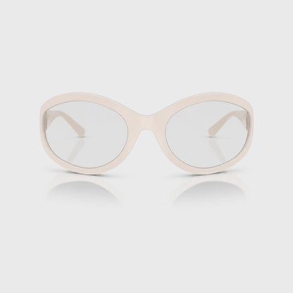 Vogue VO5606S photochromic brown replacement lenses, front video of the lenses darkening from clear to brown · ReFramed