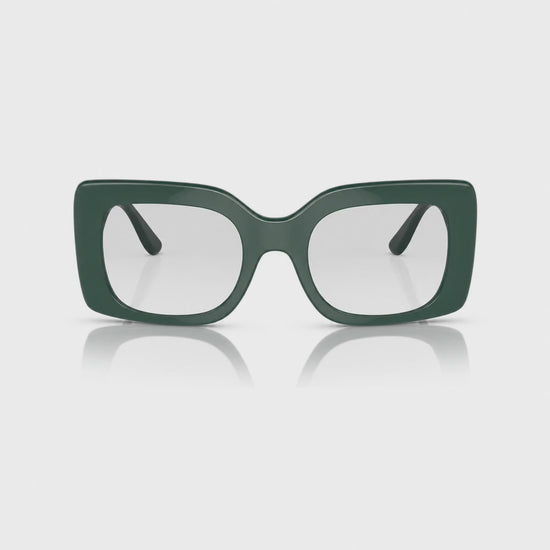 Vogue VO5481S photochromic brown replacement lenses, front video of the lenses darkening from clear to brown · ReFramed