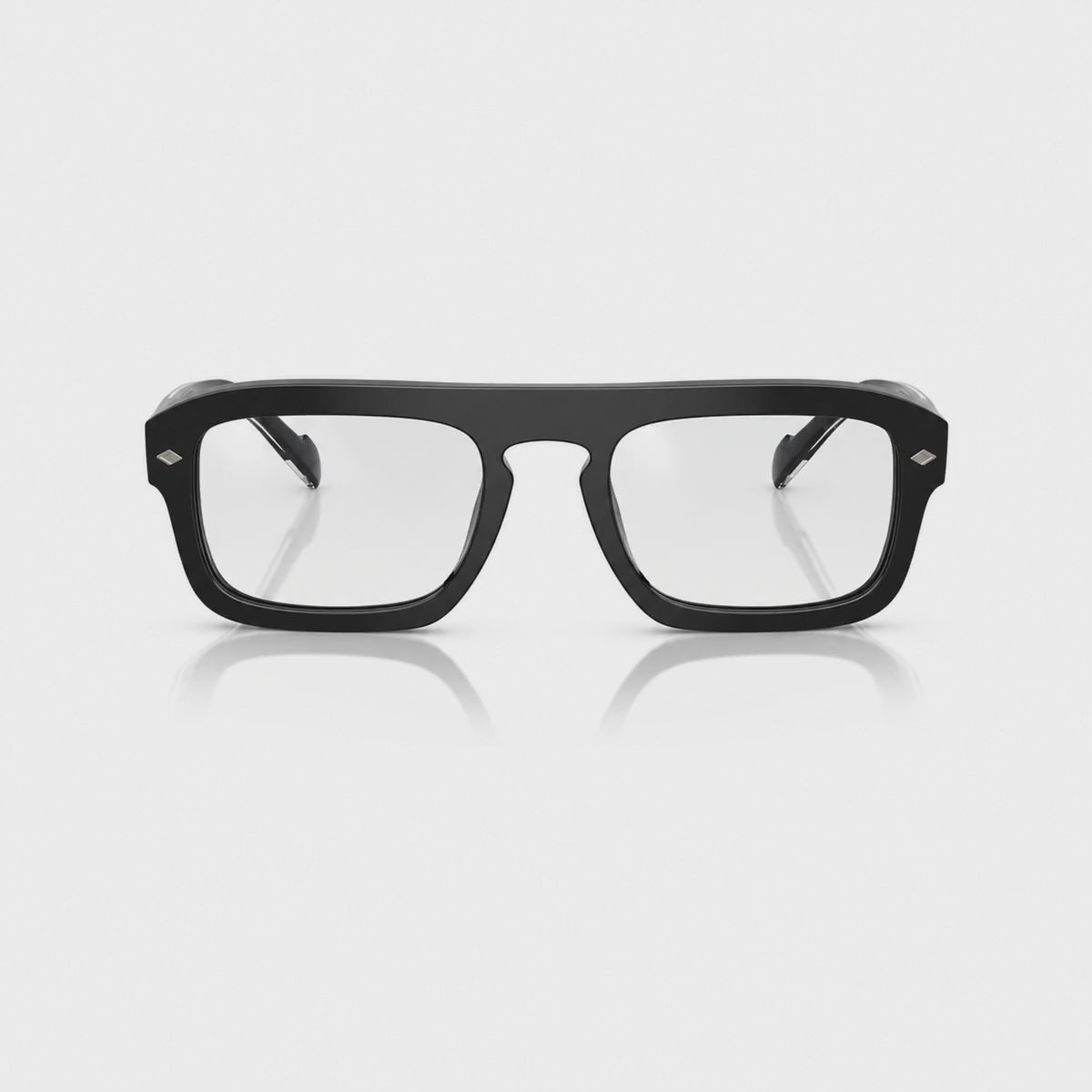 Vogue VO5620S photochromic brown replacement lenses, front video of the lenses darkening from clear to brown · ReFramed
