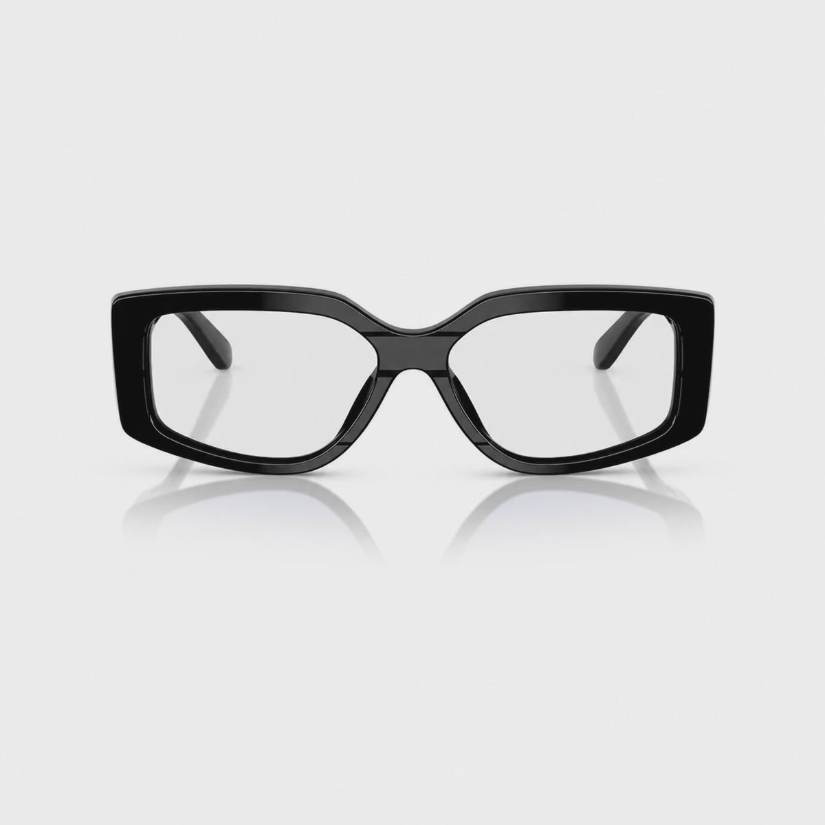 Vogue VO5642SU photochromic gray replacement lenses, front video of the lenses darkening from clear to gray · ReFramed