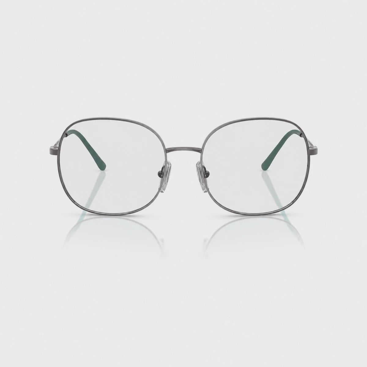 Vogue VO4272S photochromic gray replacement lenses, front video of the lenses darkening from clear to gray · ReFramed