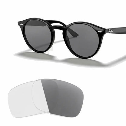 Ray-Ban RB2180 replacement lenses in photochromic gray, angled view of the frame with the pair of lenses below · ReFramed