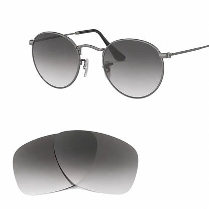 Ray-Ban Round Metal RB3447 replacement lenses in gradient gray, angled view of the frame with the lens pair · ReFramed
