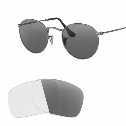 Ray-Ban Round Metal RB3447 replacement lenses in photochromic gray, angled view of the frame with the lens pair · ReFramed